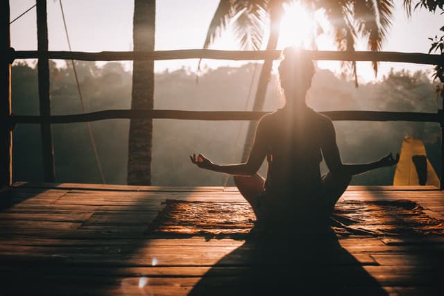 Person meditating calmly